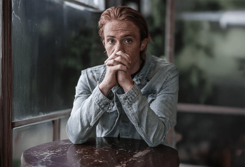 A man with denim jacket